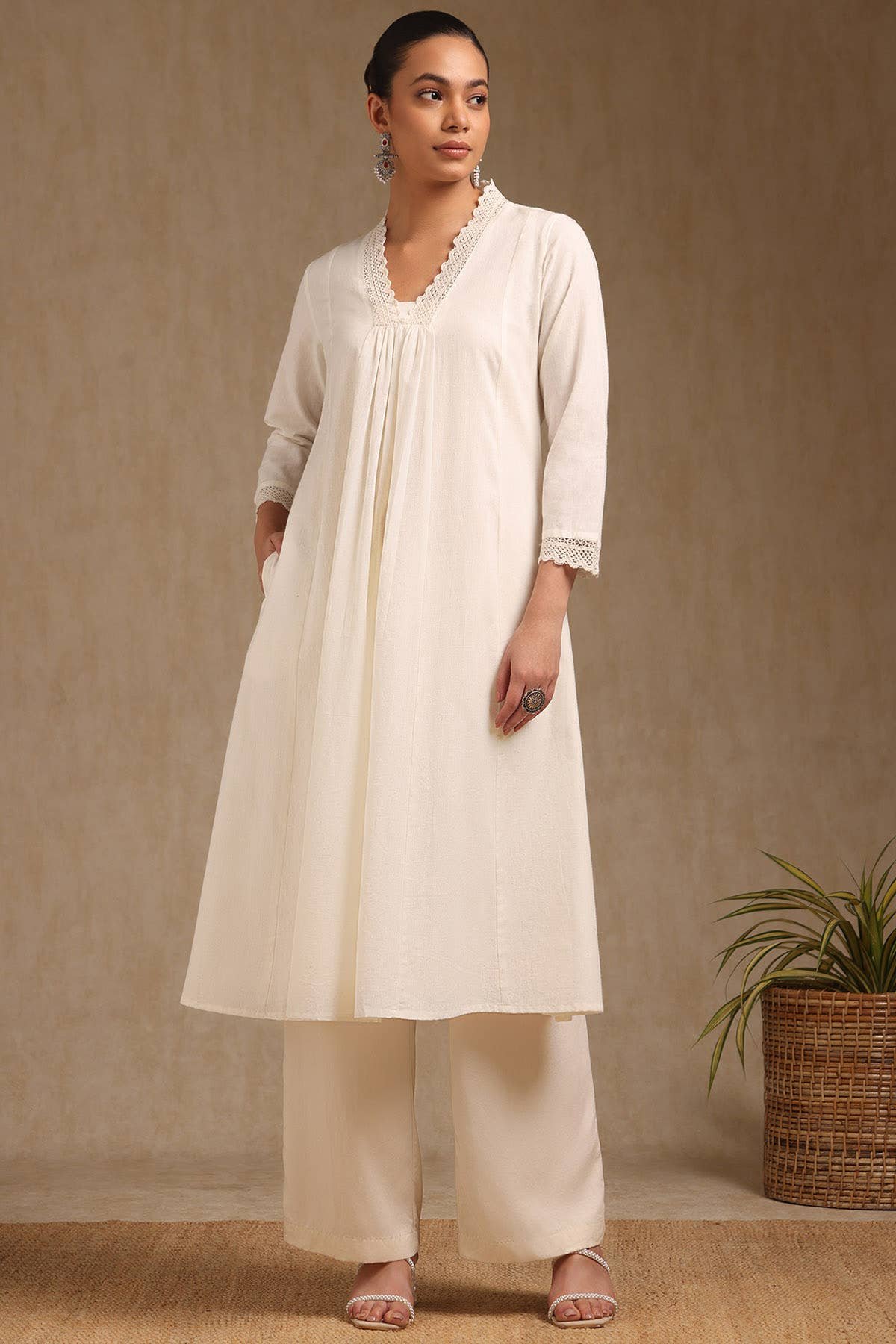 Off White Cotton Solid V-Neck Lace Inserts A-Line Kurta With Front Pleats — image 2