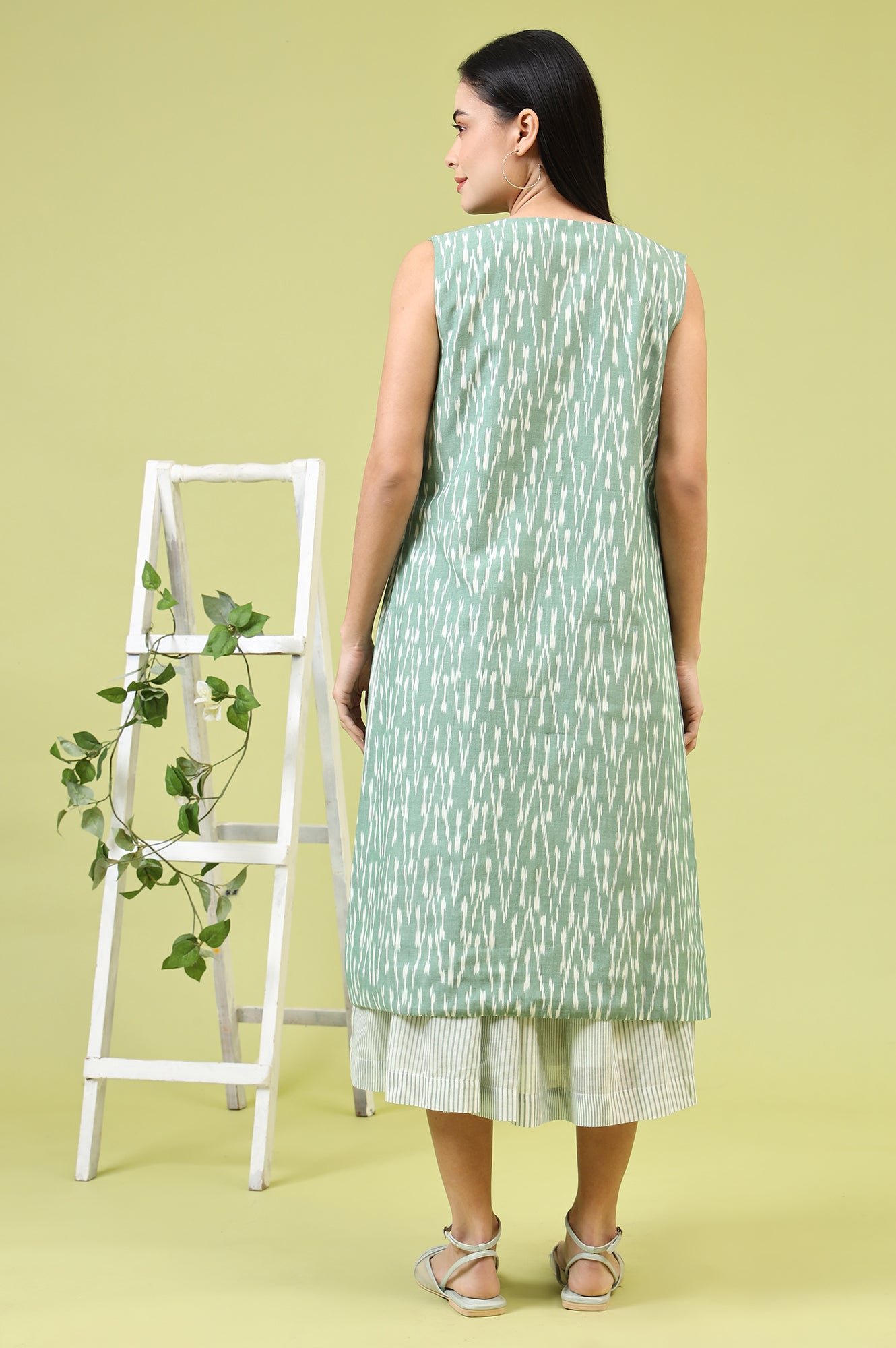 White and Green Geometric Printed Flared Spaghetti Dress and Gilet Set — image 9